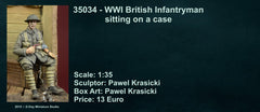 WWI British Infantryman sitting on a case